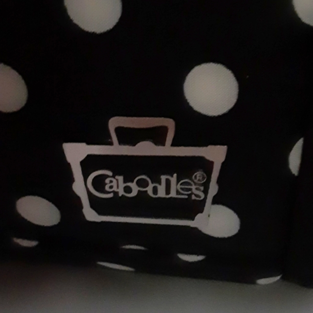Caboodles cosmetic travel bag. Black/white pot a dots.